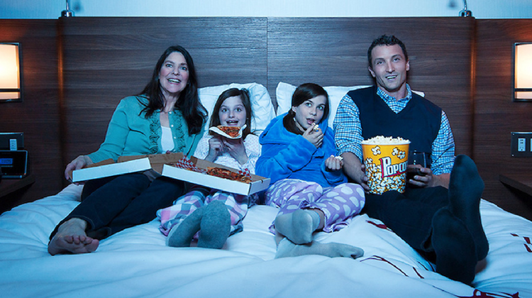 personal-area-networks-family-watching-movie.png